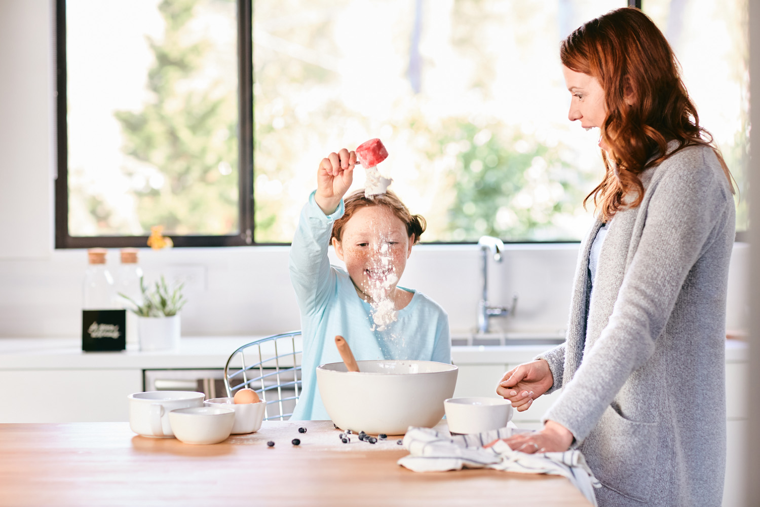 Lifestyle image of a mother and daughter in the kitchen in Portland, Oregon