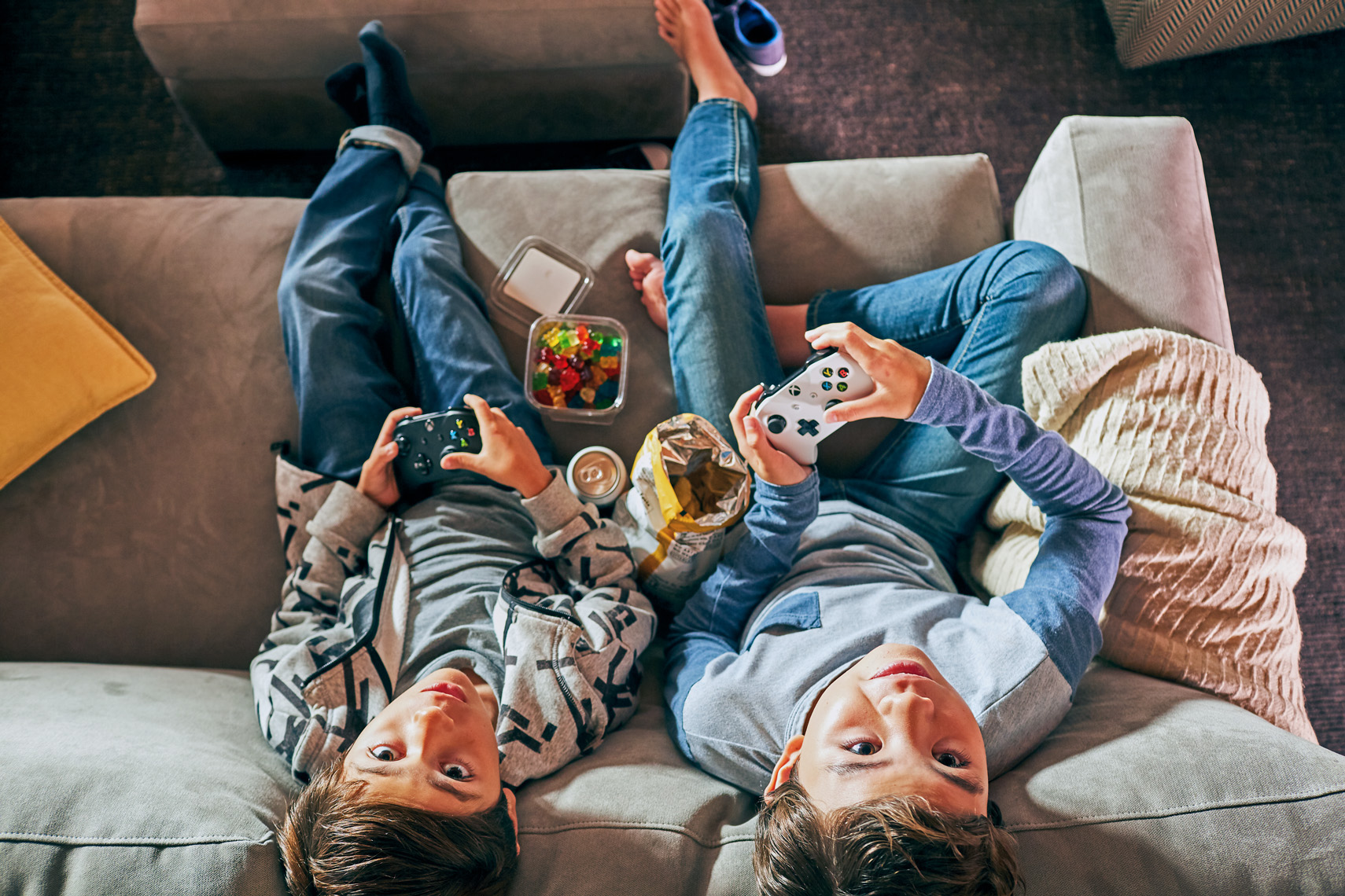 Kids pause from playing video games in this image by Leah Verwey